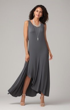 a woman wearing a charcoal gray sleeveless dress that is form fitting and flows with the body