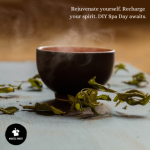 A steaming cup of tea in a simple tea cup with tea leaves scattered around. The saying, "Rejuvenate yourself. Recharge your spirit, DIY Spa Day awaits." Mystic Thrift Store logo.